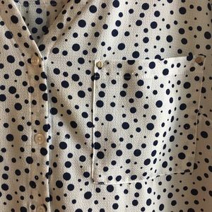 White and navy pok-a-dot blouse